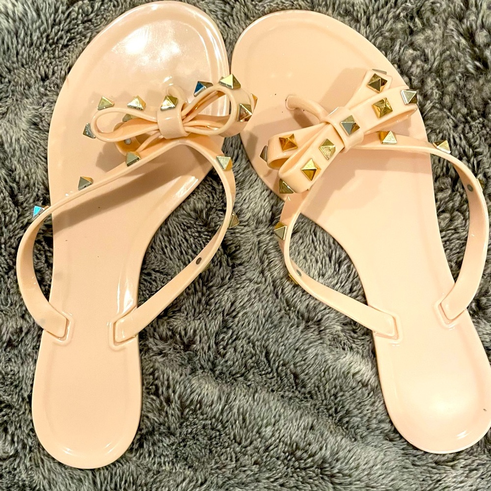 Brand new, never worn sandals size 7.